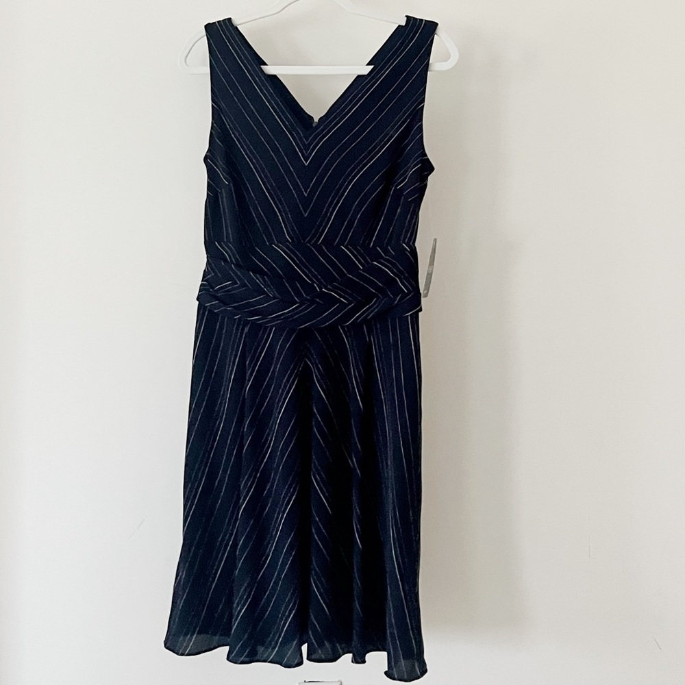 Brand new Ralph Lauren navy sleeveless dress perfect for work or cocktails.